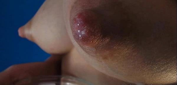  Young girl milking her big beutiful tits close up on camera